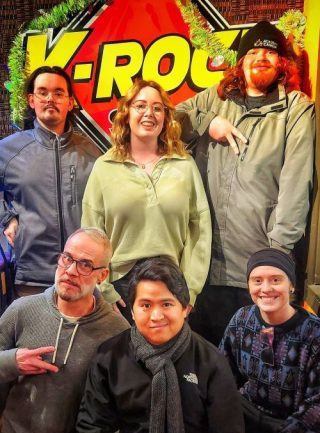 Six mentors and mentees at Stingray Radio in Newfoundland.